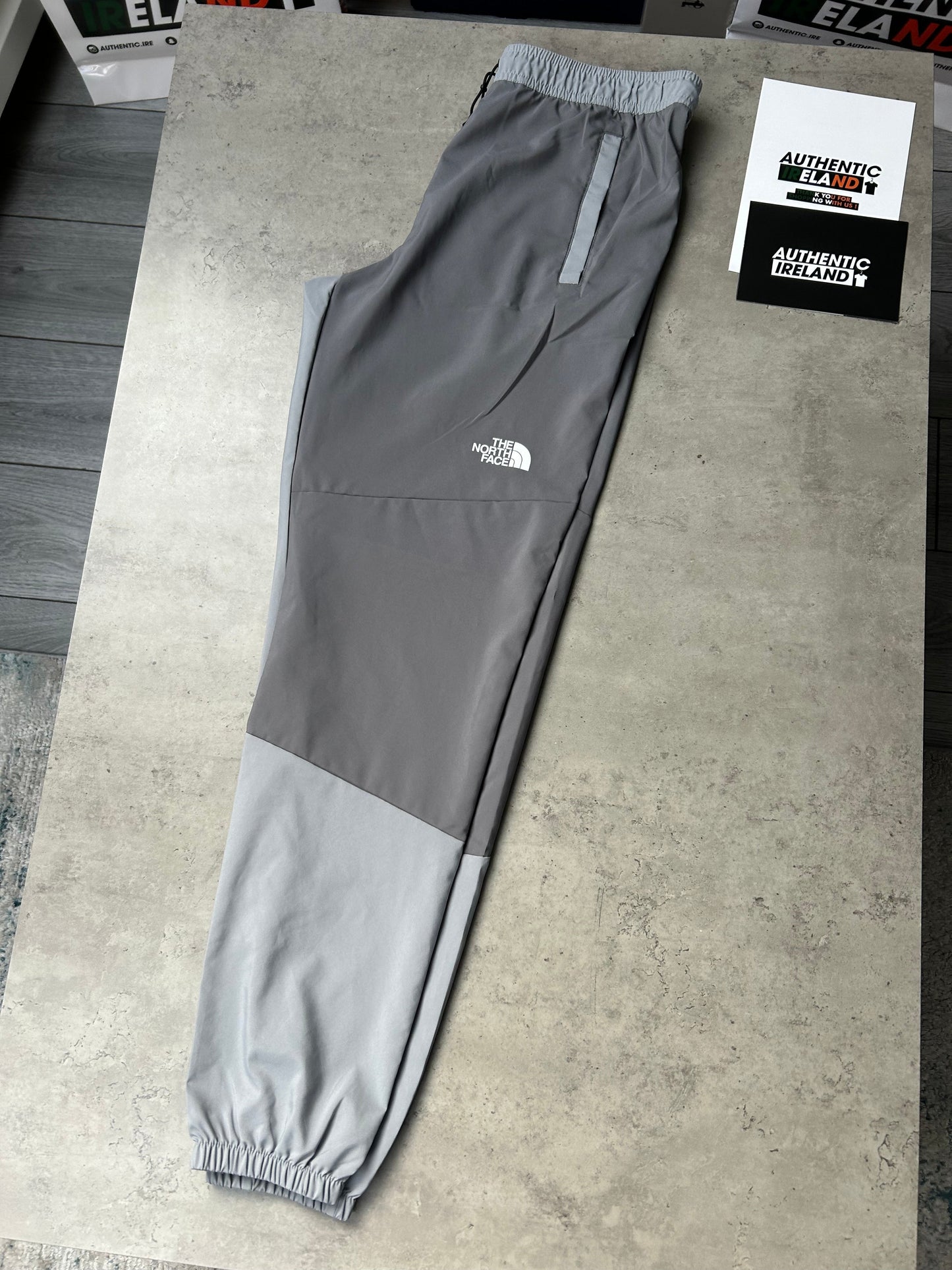 THE NORTH FACE TWO-TONE WOVEN TRACKSUIT - GREY